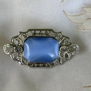 1928 Jewelry Company Art Deco Style Pale Blue Art Glass Pin set in Silver